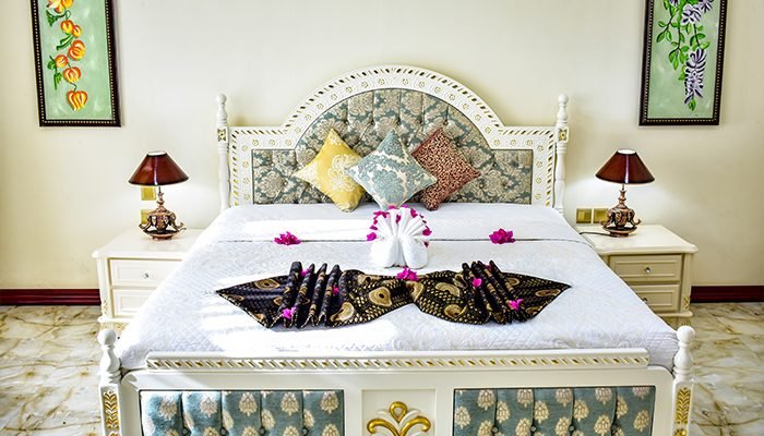 Zanzibari four poster bed dressed for a honeymoon stay
