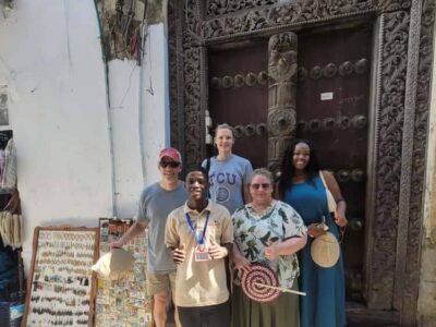 Guests with their guide in Stone Town, part of the Stone Town and Prison Island tour